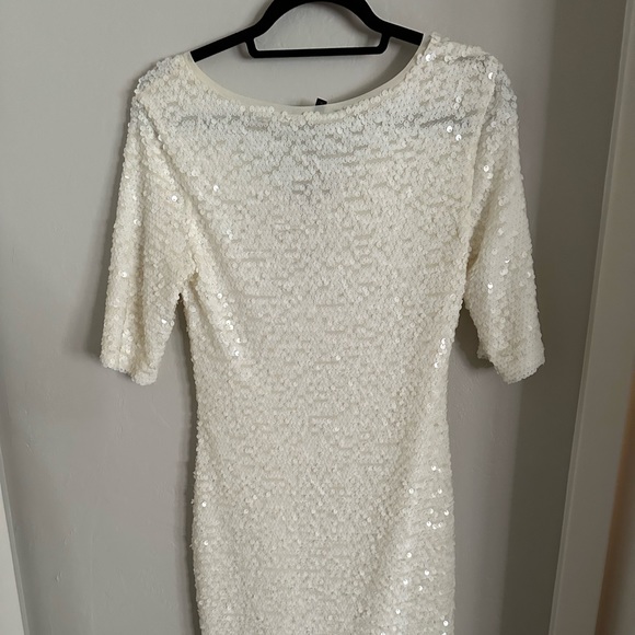 New w/Tags BCBG dress. Never worn, beautiful body con fit. Just decluttering😀 - Picture 3 of 7